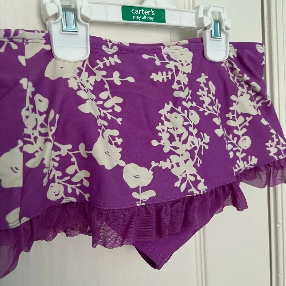 Hanna Swim bottoms, size 130 (8 -10), good condition